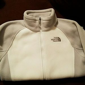 White and gray north face fleece